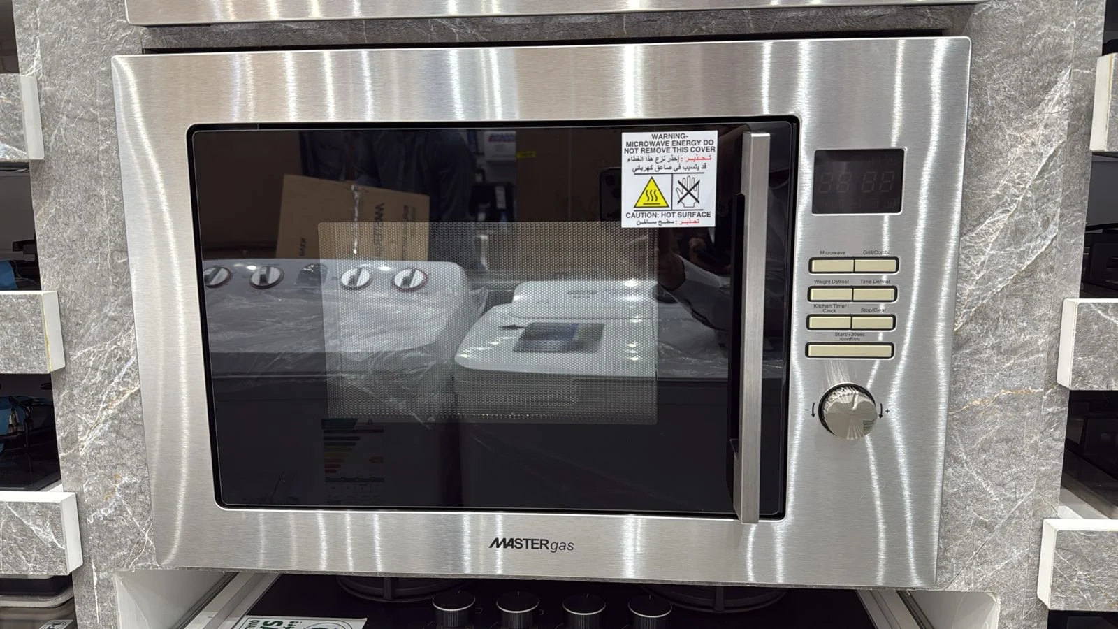 cN0sgoYQxTXsJUTdmjrKm3CqRVUdBOo5zKgieXvk.webp ماستر جاز - ميكرويف بلت إن – سعة 25 لتر – مع شواية - ( المقاس 60 * 38 ) - MGMic-25B - الصورة 1